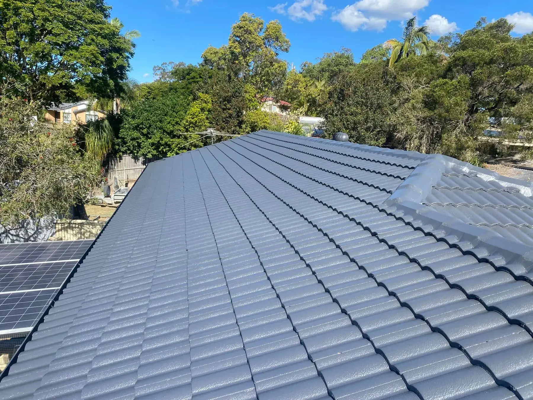 Charcoal tile roof at Boronia Heights after restoration