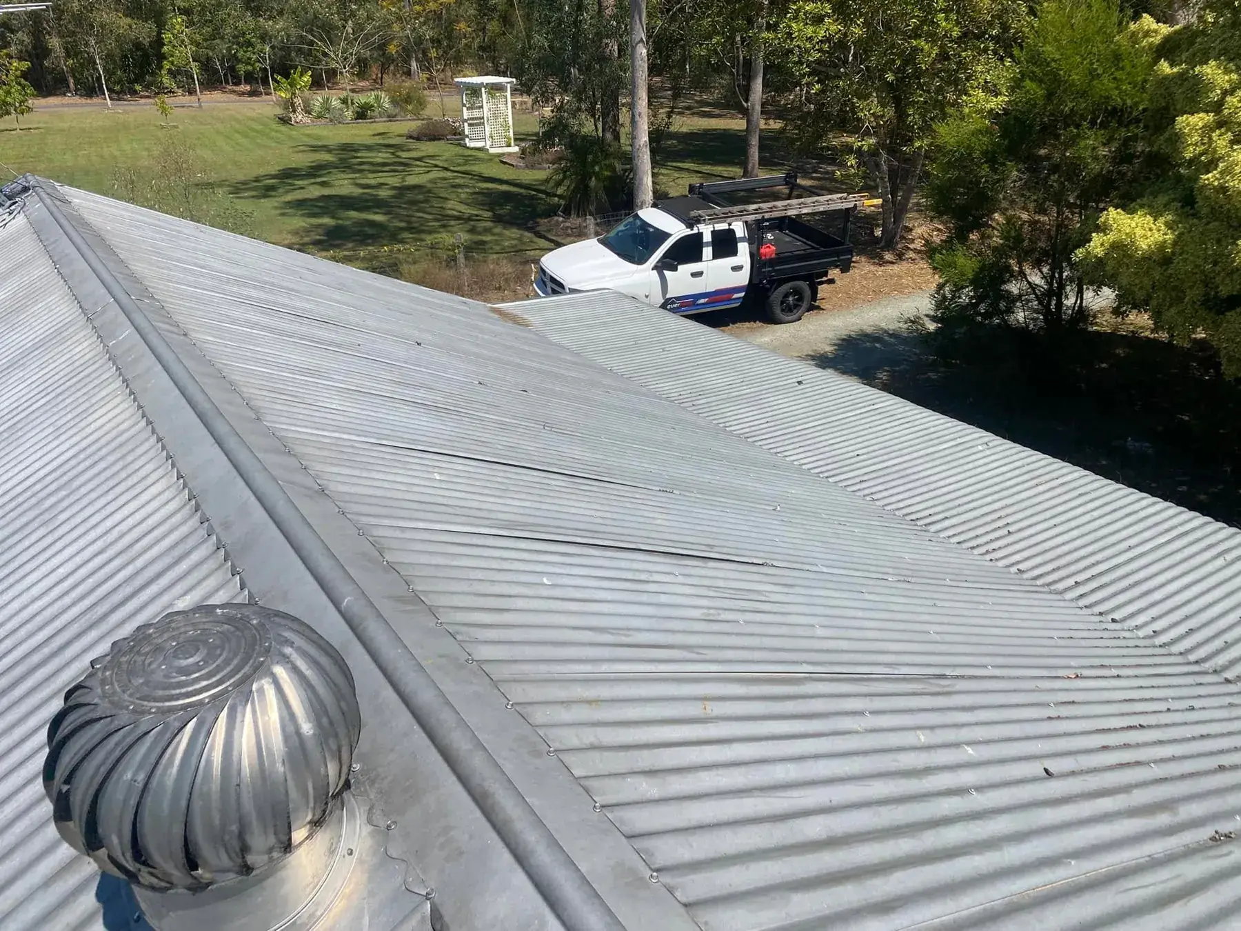 Corrugated metal roof in Logan Village, after restoration
