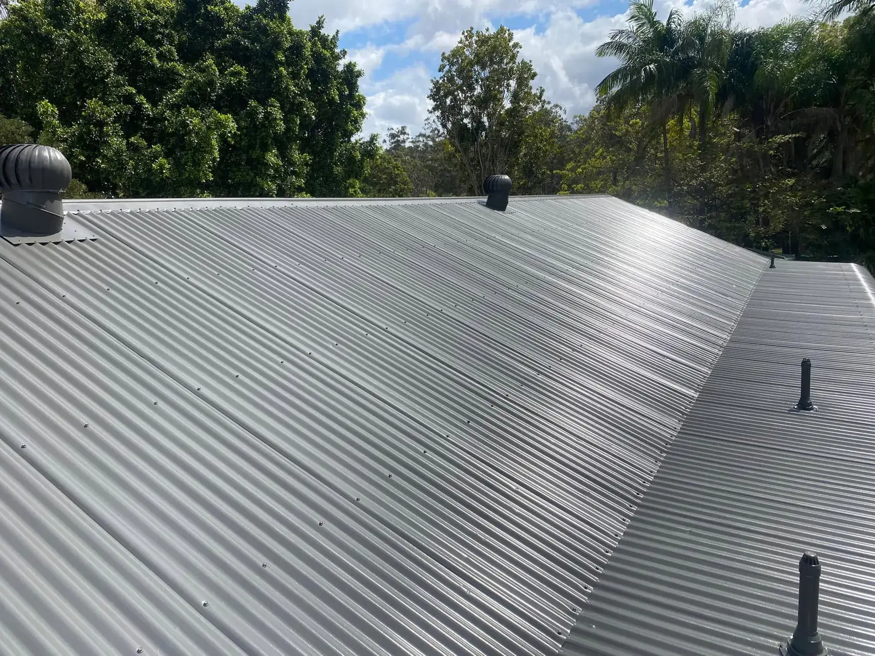 Corrugated metal roof in Logan Village, after restoration