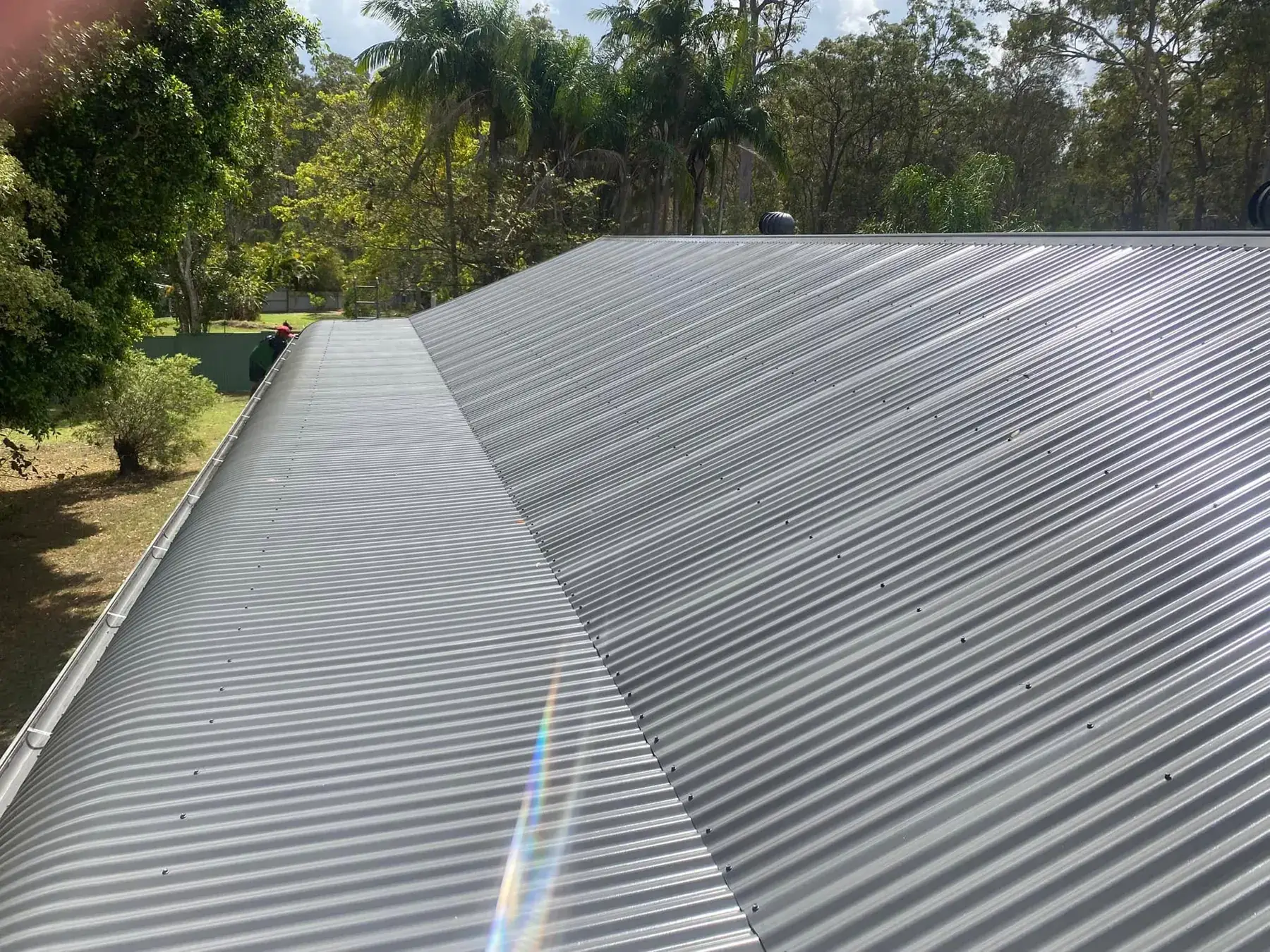Corrugated metal roof in Logan Village, after restoration