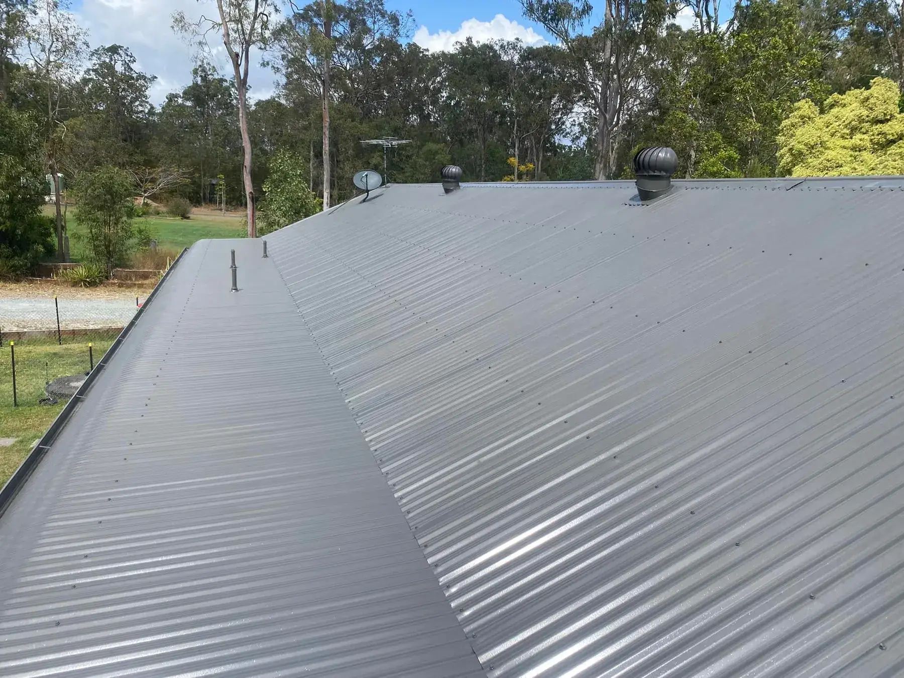 Corrugated metal roof in Logan Village, after restoration
