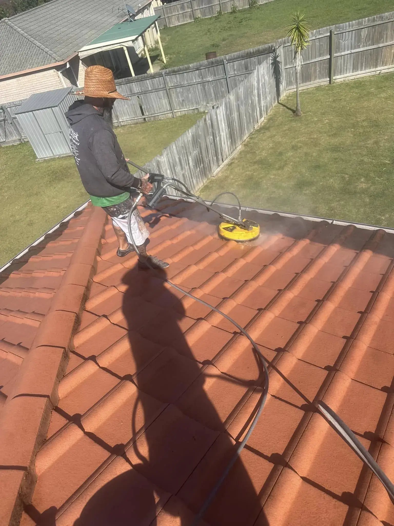 Pressure cleaning terracotta tiles with a rotary surface cleaner