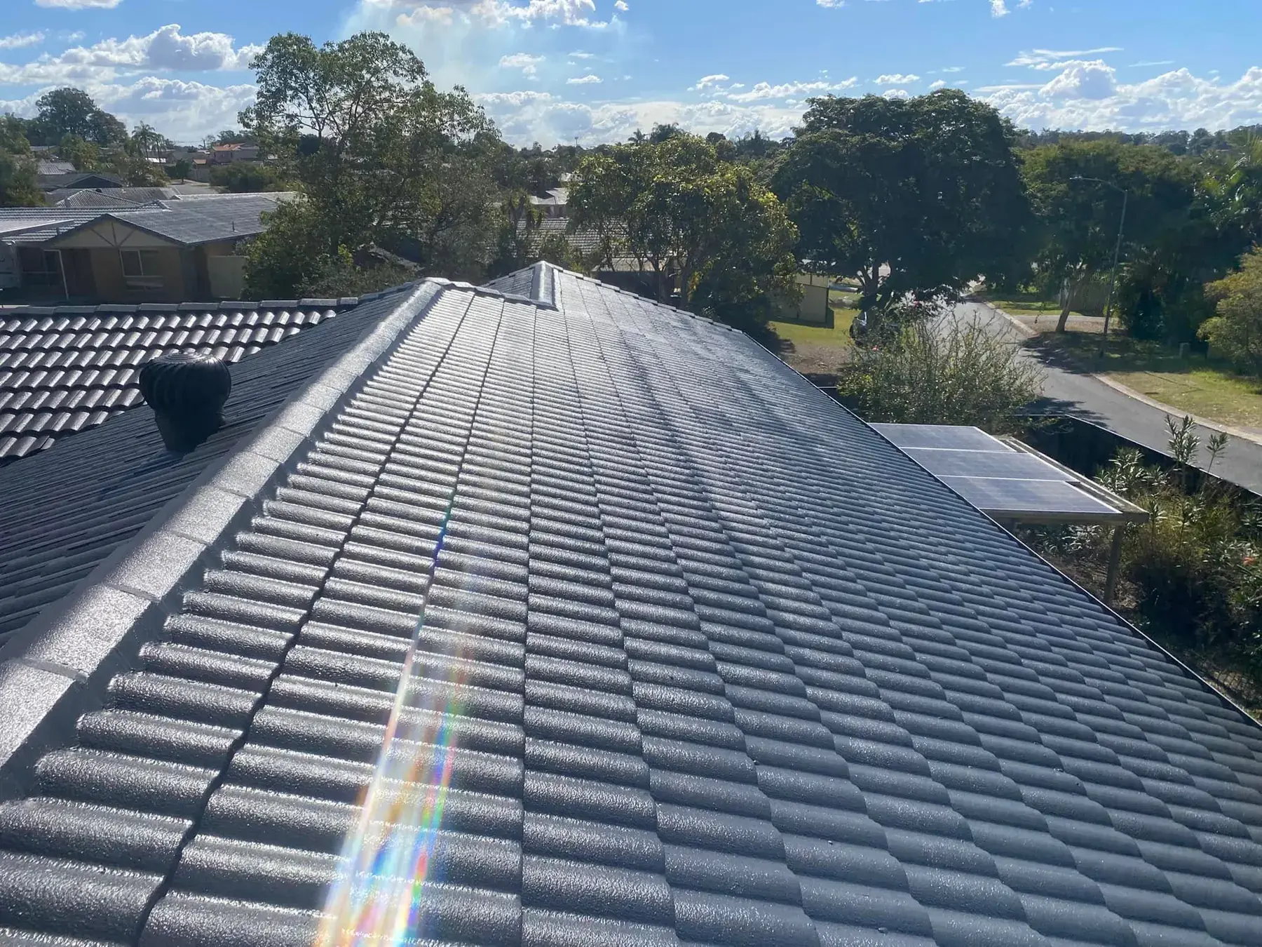 Charcoal tile roof at Boronia Heights after restoration
